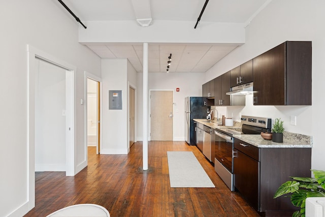 2 Main St Unit 17-415, Biddeford, ME 04005 - kitchen with stainless steel appliances, under cabinet range hood, dark wood-style floors, and dark brown cabinets