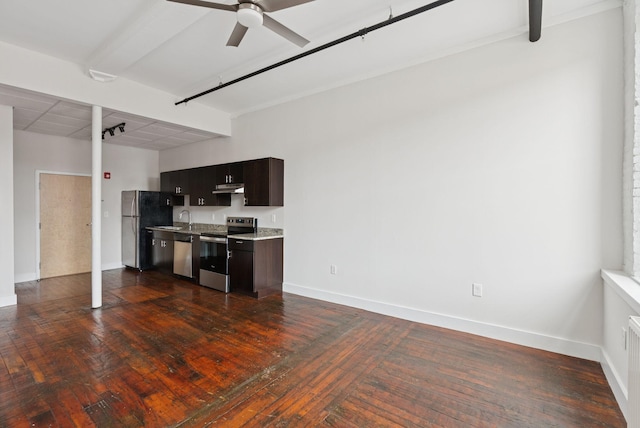 2 Main St Unit 17-415, Biddeford, ME 04005 - kitchen with stainless steel appliances, under cabinet range hood, light countertops, dark wood-style floors, and a ceiling fan