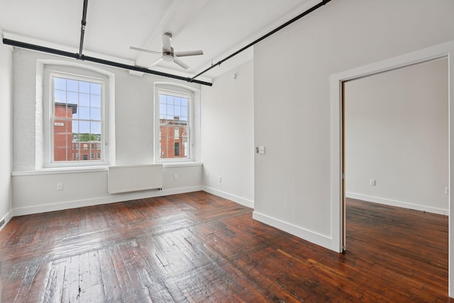 2 Main St Unit 17-415, Biddeford, ME 04005 - unfurnished room featuring radiator, ceiling fan, and wood-type flooring