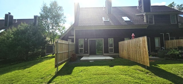 9 Hubbard Farms Rd Unit 15, Orono, ME 04473 - back of property with a patio area and a chimney