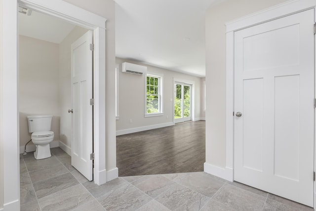 24 Varney Mill Rd Unit 3, Windham, ME 04062 - bathroom with a wall unit AC and baseboards