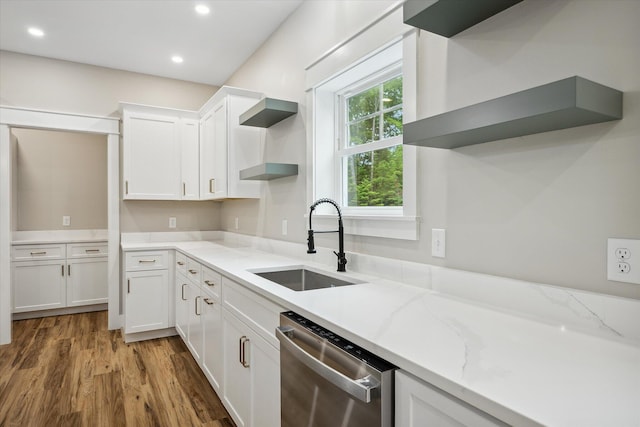 18 Crestwood Dr, Orrington, ME 04474 - kitchen with stainless steel dishwasher, open shelves, white cabinetry, wood finished floors, and light stone countertops