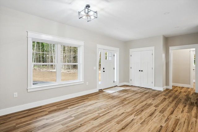 18 Crestwood Dr, Orrington, ME 04474 - foyer featuring light wood-type flooring and baseboards