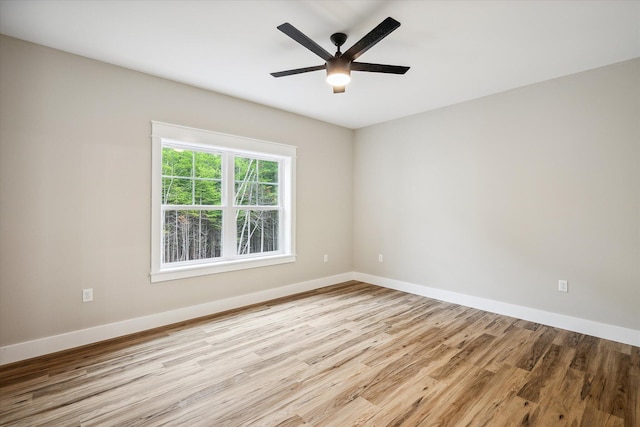 18 Crestwood Dr, Orrington, ME 04474 - spare room with light wood finished floors and a ceiling fan