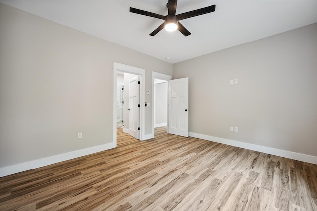 18 Crestwood Dr, Orrington, ME 04474 - unfurnished bedroom featuring light wood-type flooring, ensuite bath, and a ceiling fan