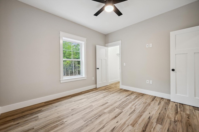 18 Crestwood Dr, Orrington, ME 04474 - unfurnished bedroom with light wood-type flooring and a ceiling fan
