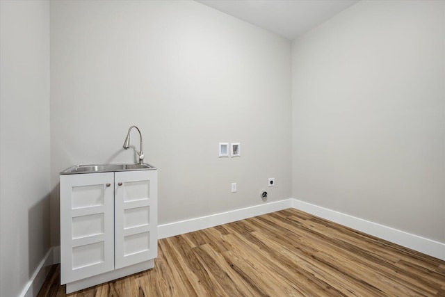18 Crestwood Dr, Orrington, ME 04474 - washroom featuring electric dryer hookup, light wood-style flooring, and washer hookup