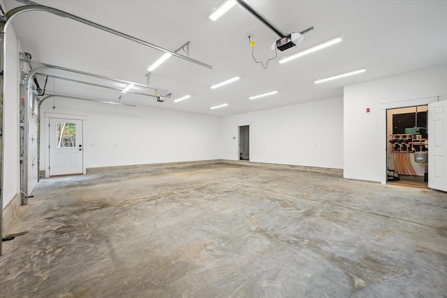 18 Crestwood Dr, Orrington, ME 04474 - garage featuring a garage door opener