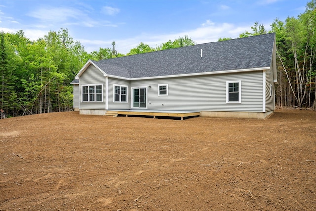 18 Crestwood Dr, Orrington, ME 04474 - rear view of property featuring a shingled roof and a deck