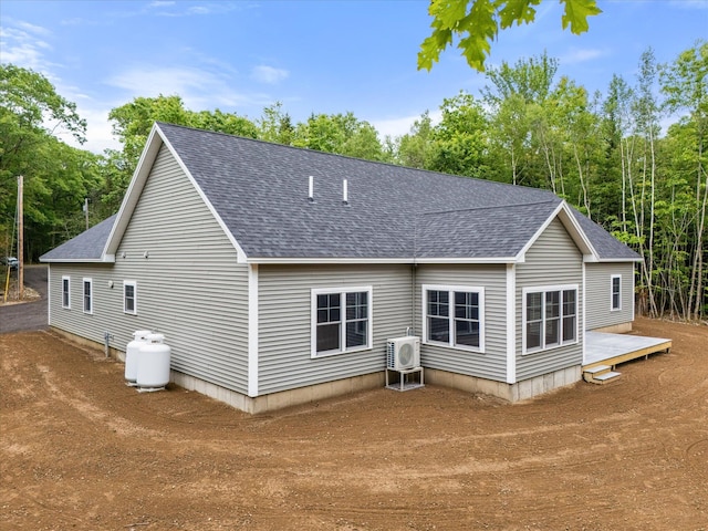 18 Crestwood Dr, Orrington, ME 04474 - rear view of house with roof with shingles and a wooden deck