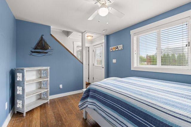 265 Nubble Rd, York, ME 03909 - bedroom with dark wood-type flooring, multiple windows, and a ceiling fan
