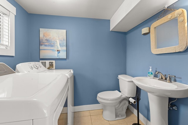 265 Nubble Rd, York, ME 03909 - half bathroom with independent washer and dryer and tile patterned floors
