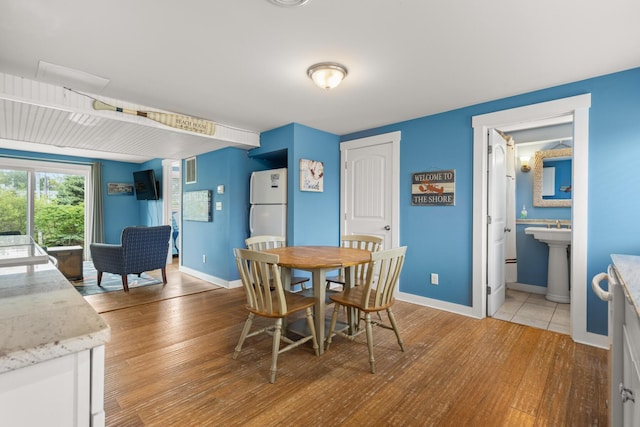 265 Nubble Rd, York, ME 03909 - dining space featuring light wood finished floors and baseboards