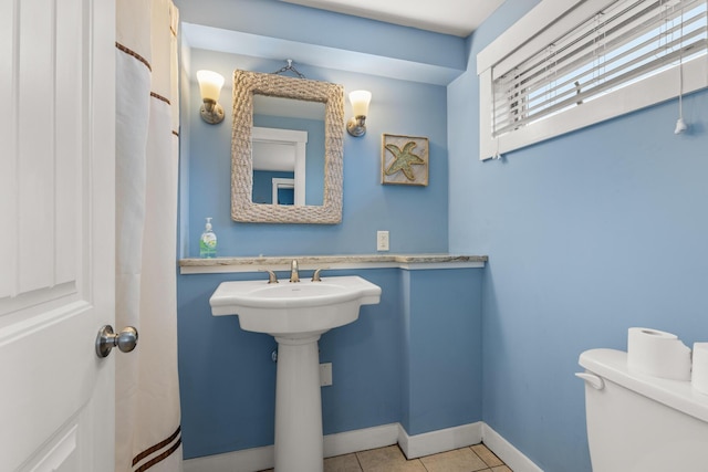 265 Nubble Rd, York, ME 03909 - bathroom featuring toilet and tile patterned floors