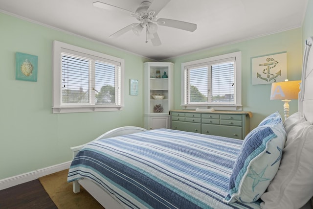 265 Nubble Rd, York, ME 03909 - bedroom featuring wood finished floors, multiple windows, ceiling fan, and ornamental molding