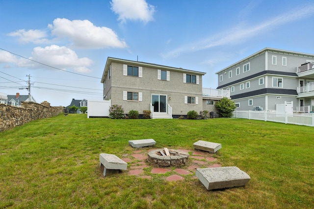 265 Nubble Rd, York, ME 03909 - back of property featuring entry steps and a fire pit