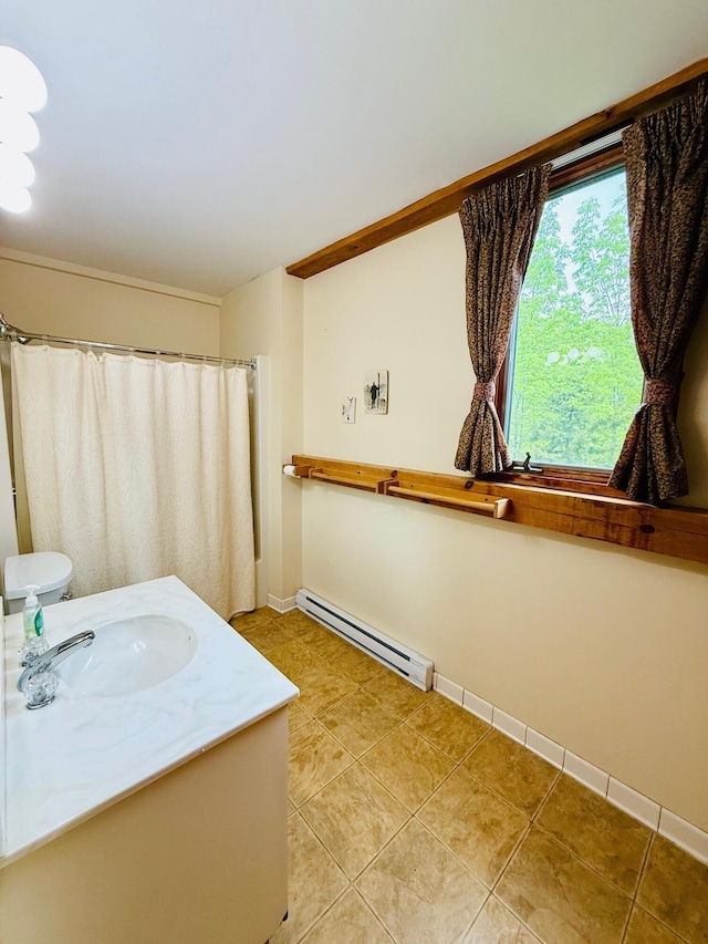 705 Webber St Unit 3, Carrabassett Valley, ME 04947 - full bath with baseboard heating, vanity, and tile patterned flooring