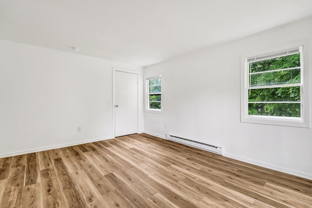 290 Gray Rd, Windham, ME 04062 - spare room featuring baseboard heating and light wood-style flooring