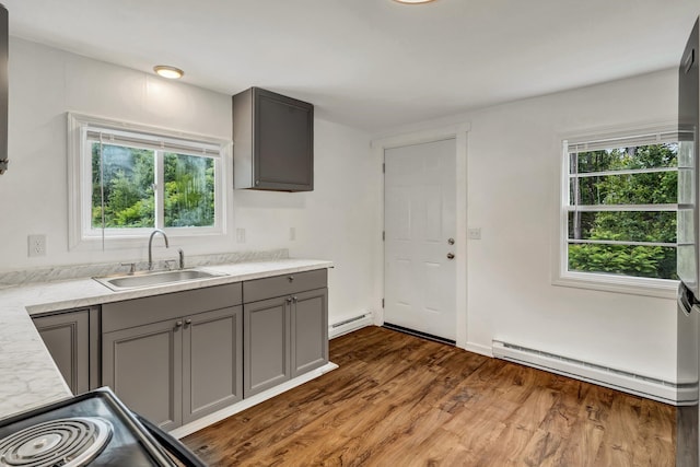 290 Gray Rd, Windham, ME 04062 - kitchen featuring gray cabinets, a baseboard heating unit, dark wood-type flooring, and black electric range oven