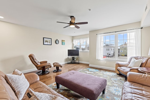 180 E Grand Ave Unit 3, Old Orchard Beach, ME 04064 - living room with ceiling fan and wood finished floors