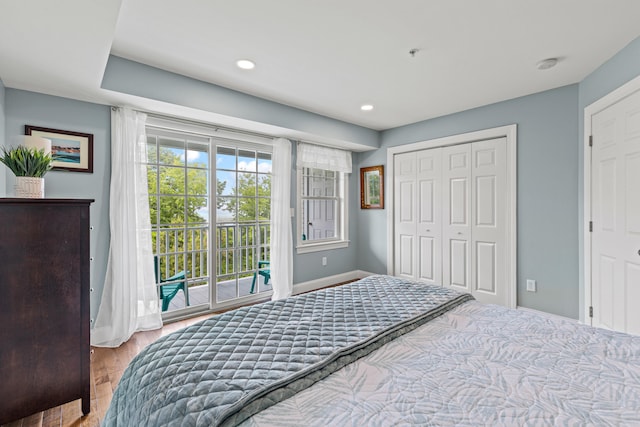 180 E Grand Ave Unit 3, Old Orchard Beach, ME 04064 - bedroom featuring access to exterior, recessed lighting, a closet, and wood finished floors