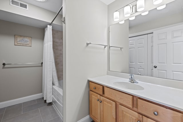 180 E Grand Ave Unit 3, Old Orchard Beach, ME 04064 - full bath with tile patterned flooring, vanity, and shower / bath combo