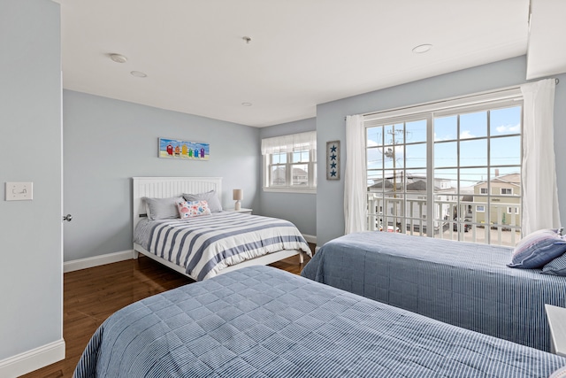 180 E Grand Ave Unit 3, Old Orchard Beach, ME 04064 - bedroom featuring baseboards and wood finished floors