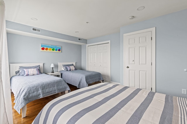 180 E Grand Ave Unit 3, Old Orchard Beach, ME 04064 - bedroom with wood finished floors and a closet