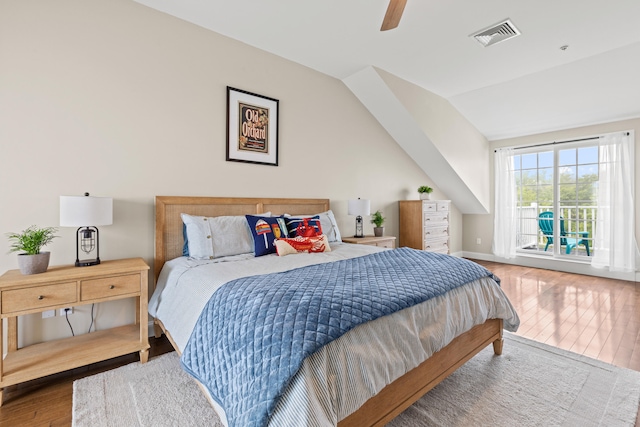 180 E Grand Ave Unit 3, Old Orchard Beach, ME 04064 - bedroom with wood finished floors, vaulted ceiling, and a ceiling fan