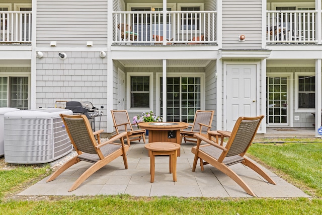 180 E Grand Ave Unit 3, Old Orchard Beach, ME 04064 - patio / terrace with an outdoor fire pit and a patio area