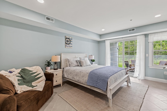 180 E Grand Ave Unit 3, Old Orchard Beach, ME 04064 - bedroom with light tile patterned flooring, access to exterior, and recessed lighting