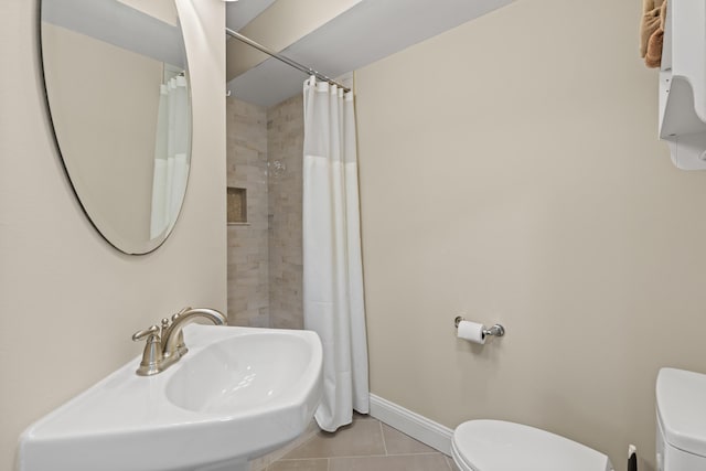 180 E Grand Ave Unit 3, Old Orchard Beach, ME 04064 - bathroom with tile patterned flooring and curtained shower
