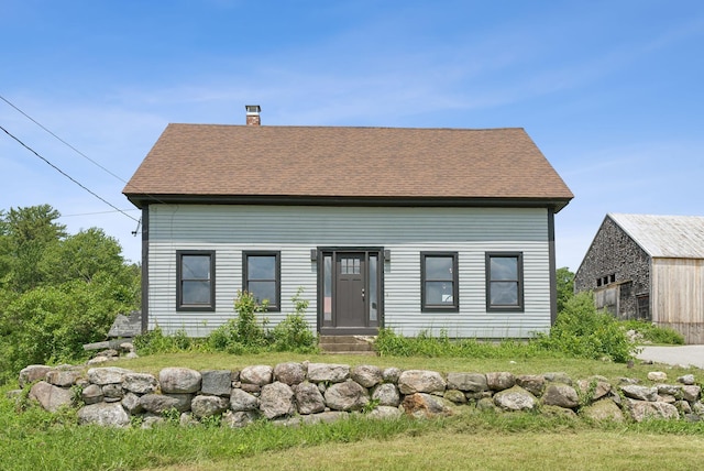 30 Graffam Rd, Baldwin, ME 04091 - view of front of home featuring a chimney and roof with shingles