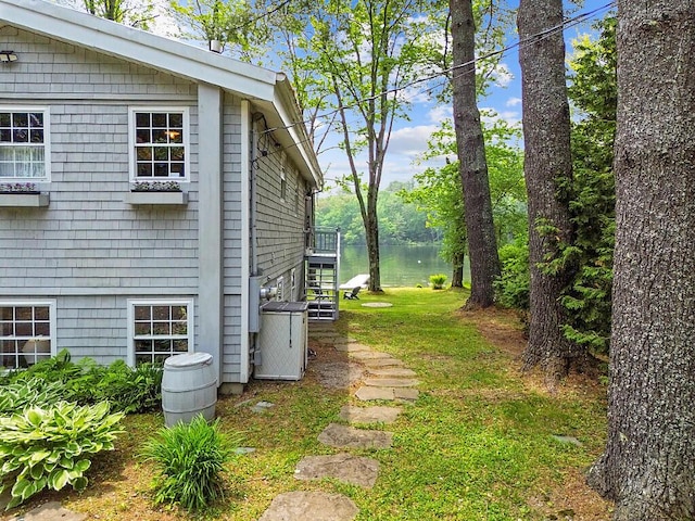 75 Spaulding Point Rd, Belgrade, ME 04917 - view of side of home featuring a water view and stairway