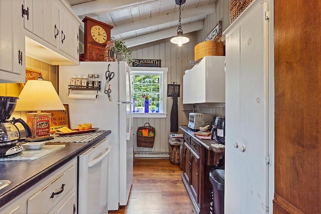 75 Spaulding Point Rd, Belgrade, ME 04917 - kitchen with white appliances, dark countertops, dark wood-style flooring, white cabinets, and decorative light fixtures