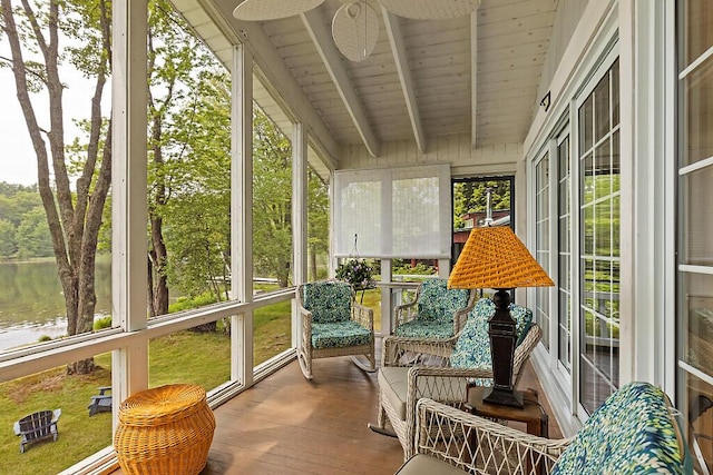 75 Spaulding Point Rd, Belgrade, ME 04917 - sunroom featuring beam ceiling, ceiling fan, and a water view
