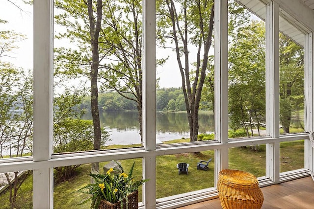 75 Spaulding Point Rd, Belgrade, ME 04917 - sunroom with a water view and plenty of natural light