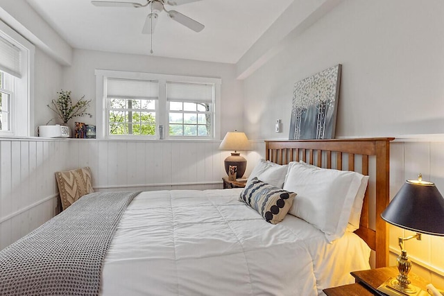 75 Spaulding Point Rd, Belgrade, ME 04917 - bedroom with wainscoting and a ceiling fan