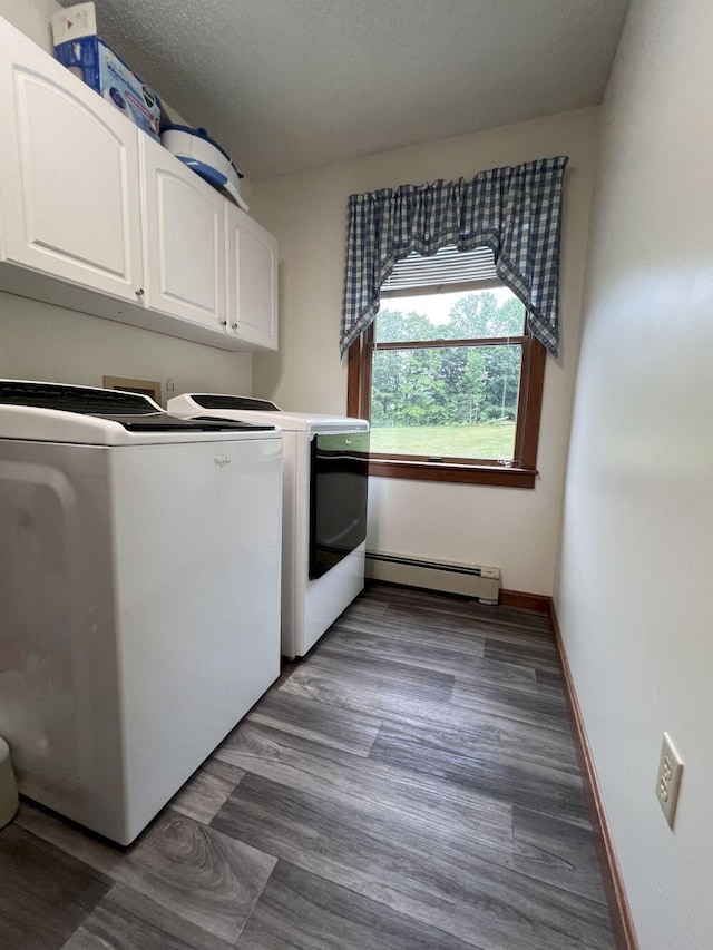 227 Back Rd, Skowhegan, ME 04976 - laundry area featuring a baseboard radiator, separate washer and dryer, and cabinet space
