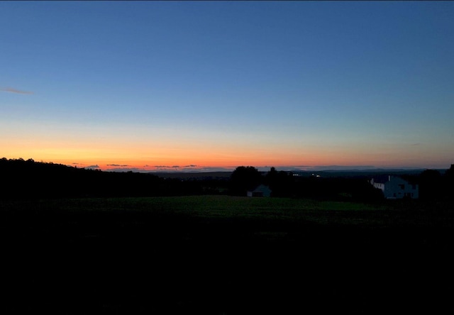 227 Back Rd, Skowhegan, ME 04976 - view of yard at dusk