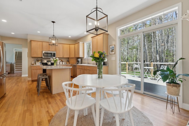 24 Cottagewood Ln, Kennebunk, ME 04043 - dining room featuring light wood finished floors, recessed lighting, and stairway