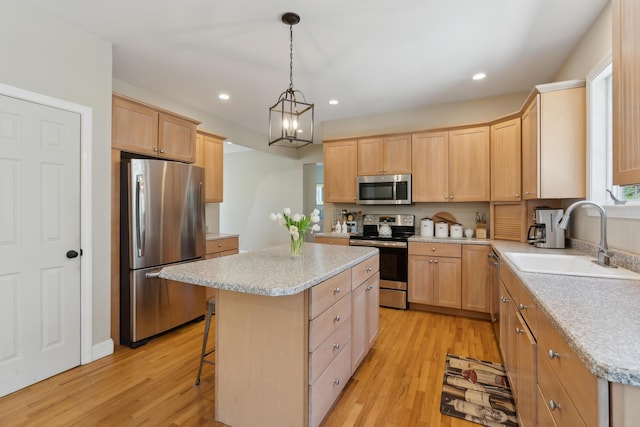 24 Cottagewood Ln, Kennebunk, ME 04043 - kitchen featuring appliances with stainless steel finishes, light brown cabinets, light wood-type flooring, and recessed lighting