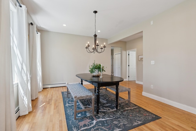 24 Cottagewood Ln, Kennebunk, ME 04043 - dining area featuring a baseboard radiator, a chandelier, light wood finished floors, and recessed lighting