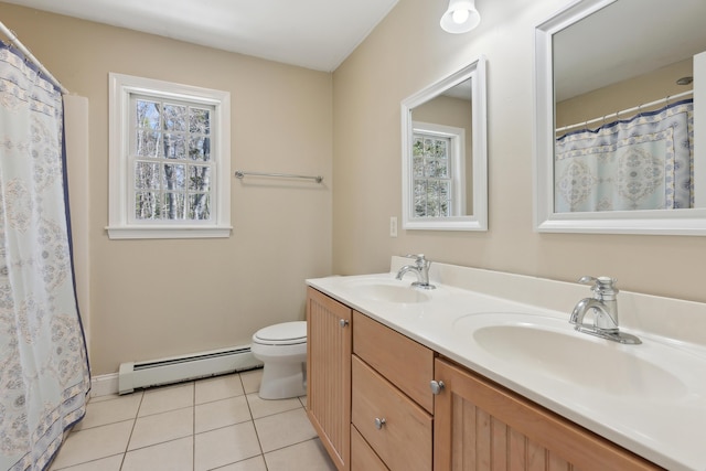 24 Cottagewood Ln, Kennebunk, ME 04043 - bathroom featuring baseboard heating, double vanity, and tile patterned floors