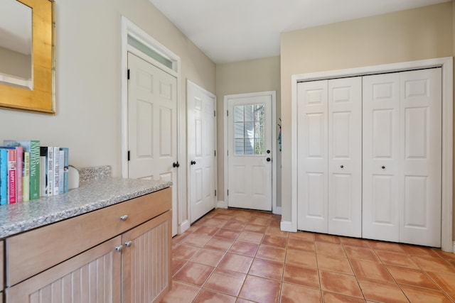 24 Cottagewood Ln, Kennebunk, ME 04043 - foyer entrance featuring light tile patterned floors