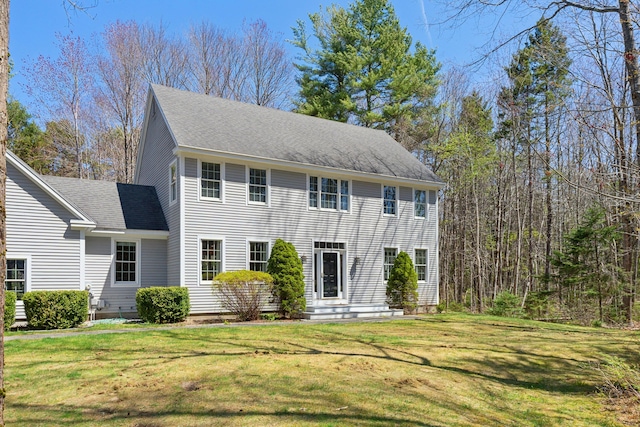24 Cottagewood Ln, Kennebunk, ME 04043 - colonial house with a front lawn and a shingled roof