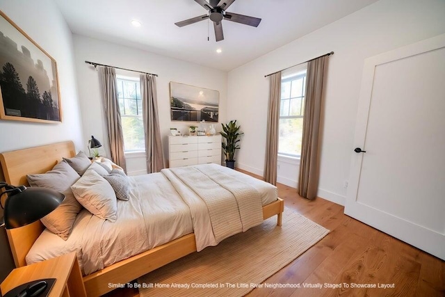 6 Whitetail St, Belfast, ME 04915 - bedroom with multiple windows, light wood-style flooring, recessed lighting, and ceiling fan