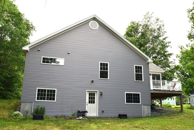 171 Hancock Pond Rd, Sebago, ME 04029 - back of house with a wooden deck