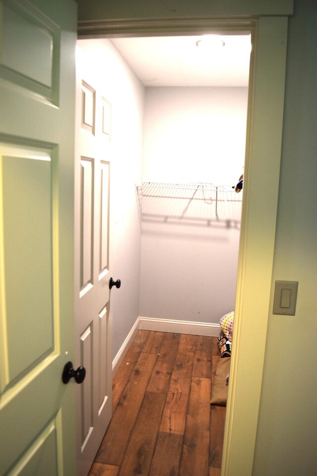 171 Hancock Pond Rd, Sebago, ME 04029 - walk in closet featuring dark wood-style flooring