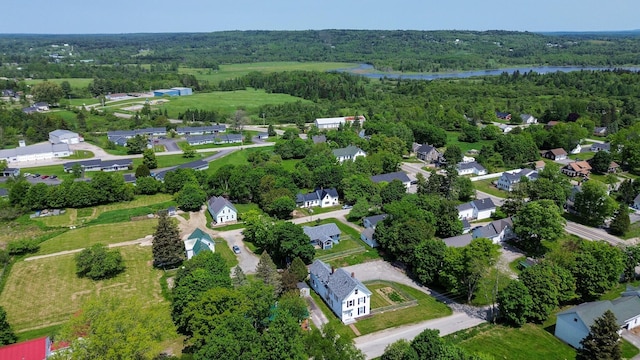 11 Gardner Ave, Machias, ME 04654 - aerial perspective of suburban area featuring a large body of water and a forest